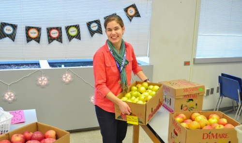 Rachel setting up for the school Pack-a-Snack  program that she coordinates. Photo by Blake Prim