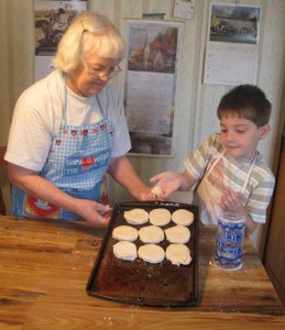 Grandmother baking with grandson